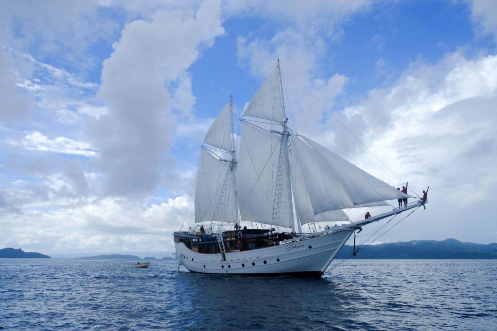 The modern Phinisi boat sailing in the sea